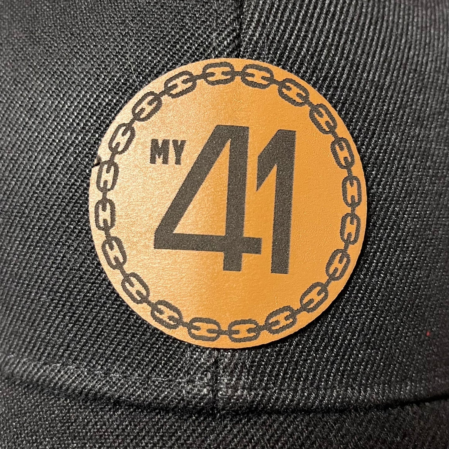 Black Snap Back Hat with Leather Logo